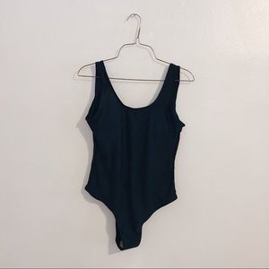 Brand new black one piece swimsuit with low back